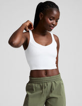 white ribbed cropped tank with a front and back soft v neckline.