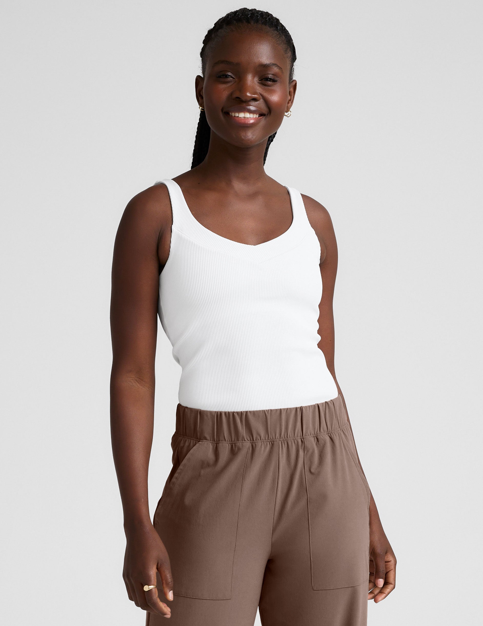 white ribbed tank top with a soft front and back v neckline.