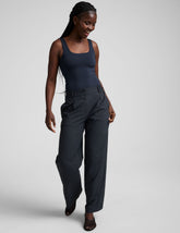 blue mid-rise wide leg pant with pockets.