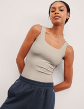 brown double-layered square neckline bodysuit.