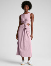 pink midi length tank dress with a scoop neckline and cutouts at waistband.