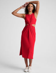red midi length dress with a cutout detailing at waist.