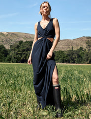 blue v-neck maxi length tank dress with cutouts at waist.