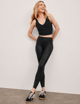 black faux leather high-waisted midi leggings.