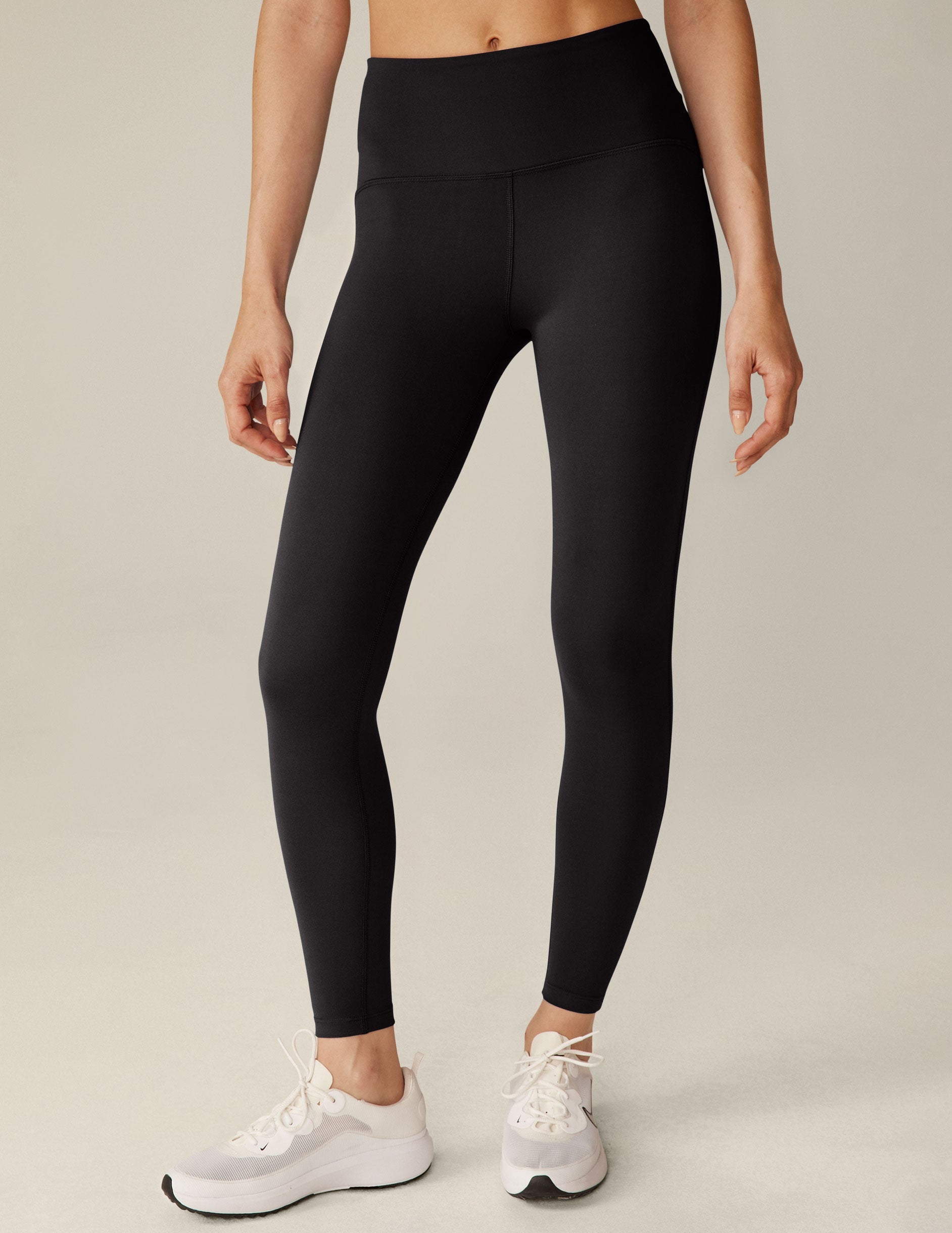 black 4-inch waistband midi leggings.