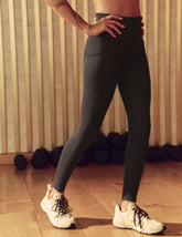 black powerbeyond midi leggings with pockets.