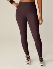 purple midi length leggings with pockets.