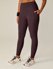 purple midi length leggings with pockets.