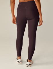 purple midi length leggings with pockets.
