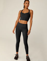 black v-neck racerback cropped POWERBEYOND tank top.
