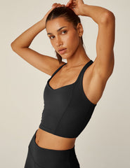 black v-neck racerback cropped POWERBEYOND tank top.