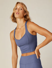 blue cropped tank with a sweetheart neckline.
