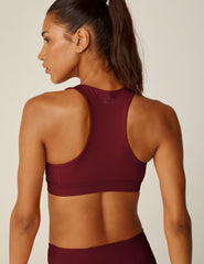 red high-neck powerbeyond bra.