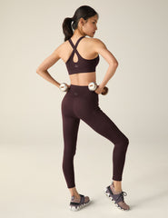 purple bra with cross straps on the back.