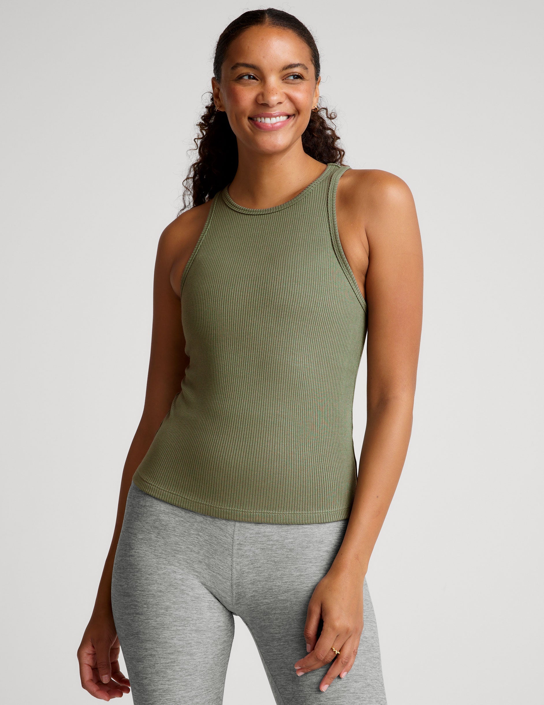 green ribbed slim fit classic length tank with a crew neckline.