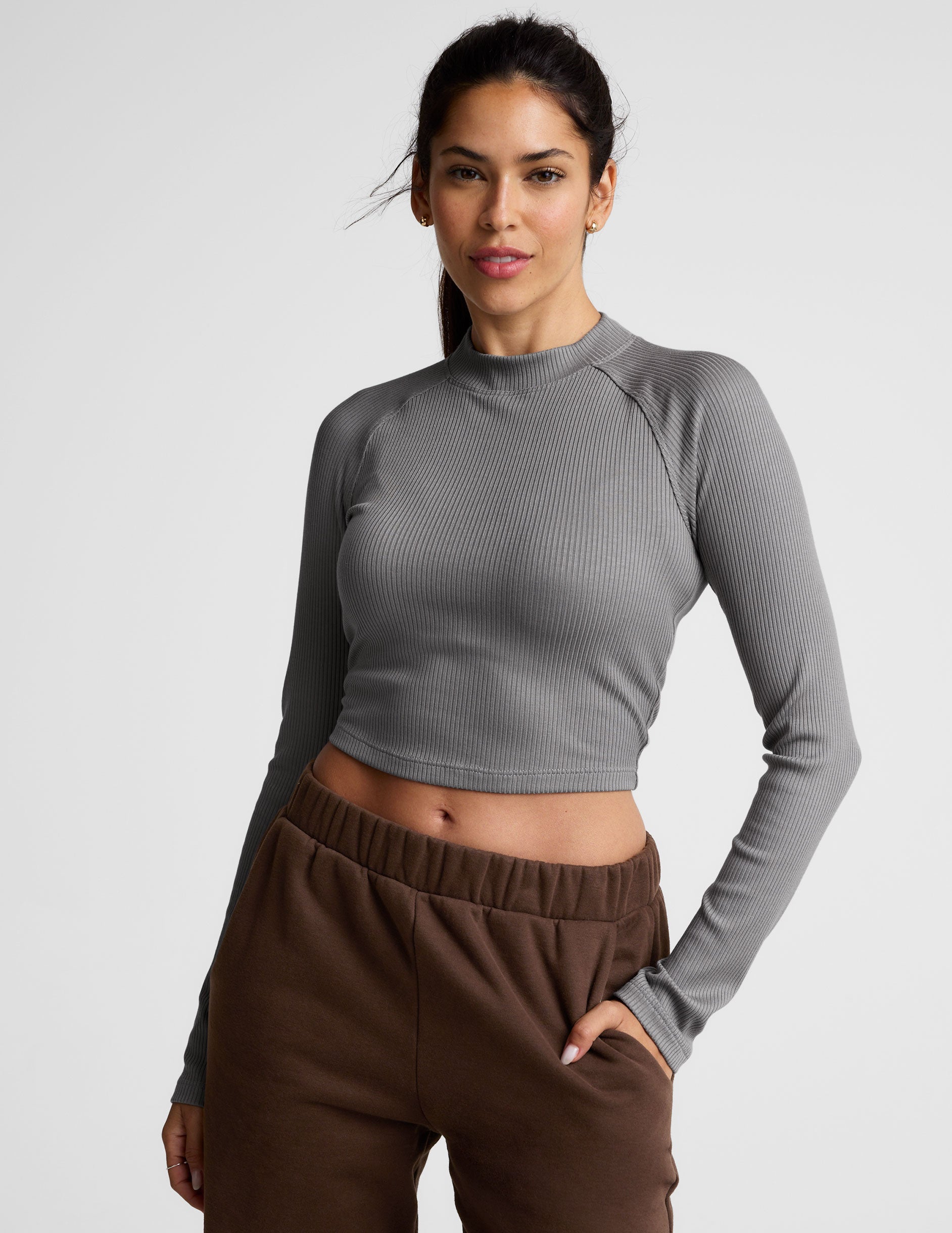 gray ribbed mock-neck cropped long sleeve top.