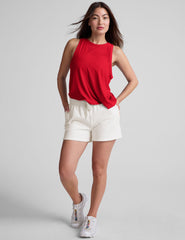 red loose-fitting tank top with a crew neckline.