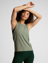 green relaxed fit tank with a hight front neckline.