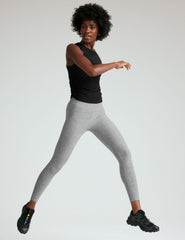 black scoop neck tank top with shirring details down the sides.