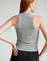 gray scoop neck tank top with shirring details down the sides.