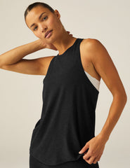 black racerback loose fitting tank top with a back keyhole with draping detail