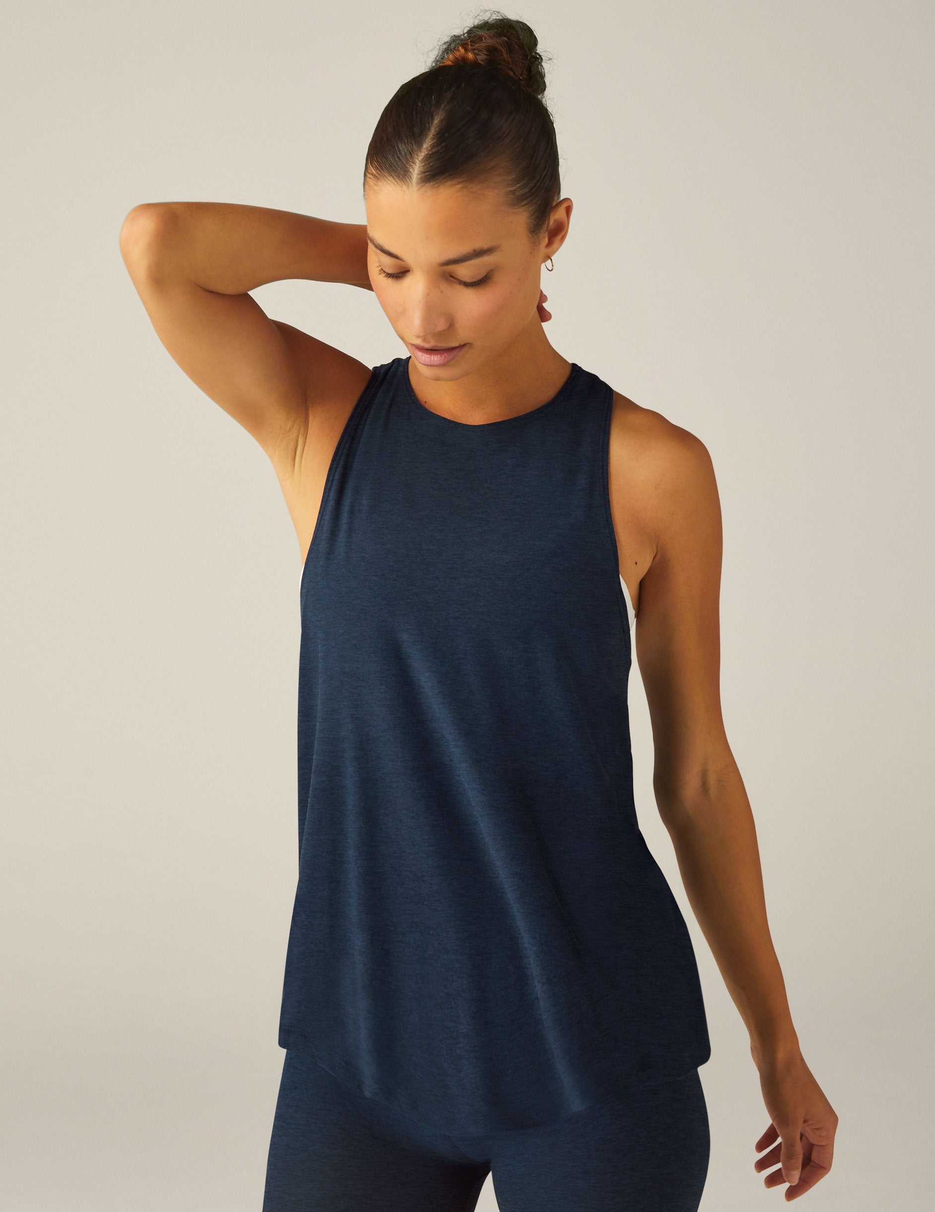 blue high scoop neck racerback tank top with a back keyhole with draping detail