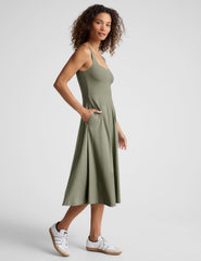 green midi length square neck dress with pockets.