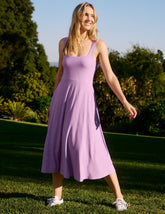 purple midi length square neck dress.