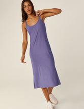 purple scoop neck midi dress with front side slit on each side.
