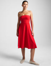 red strapless midi dress with pockets.