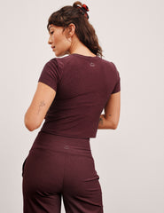 red lightweight cropped baby tee.