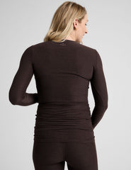 brown long sleeve crew neckline maternity top with thumb holes.