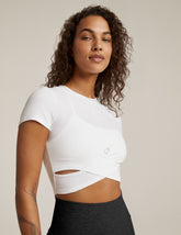 white short sleeve top with criss cross detail at front