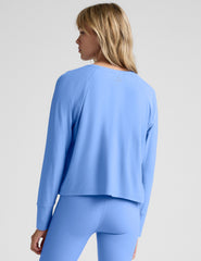 blue long sleeve scoop neck lightweight top.