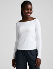 white boatneck long sleeve top.