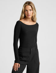 black boat neck long sleeve top.