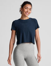 blue short sleeve cropped t-shirt with a scooped neckline.