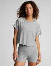 gray short sleeve loose-fitting cropped tee with a scoop neckline.
