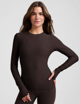 brown crew neck long sleeve with thumb holes.