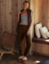 brown jogger style sweatpants with pockets.