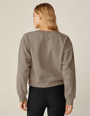 brown crew neck long sleeve pullover.