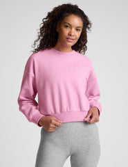 pink crew neck loose-fitting classic length sweatshirt.