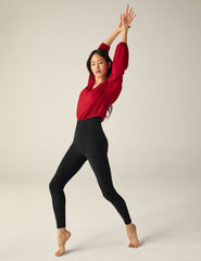 red v-neck cropped sweater.