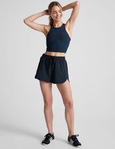 blue 2.5" inseam shorts with pockets and a drawcord at waistband.