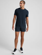 navy t-shirt and navy 5" shorts on a plain background.