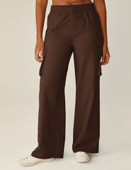 brown cargo style pants with side pockets.