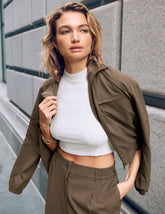 brown zip-up jetstretch woven jacket with a collar and pockets.