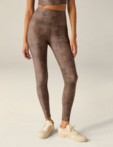 brown faux snakeskin printed high-waisted midi leggings.