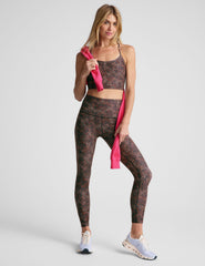 leopard printed racerback cropped tank top.