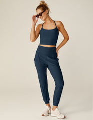 blue high-waisted jogger with pockets.